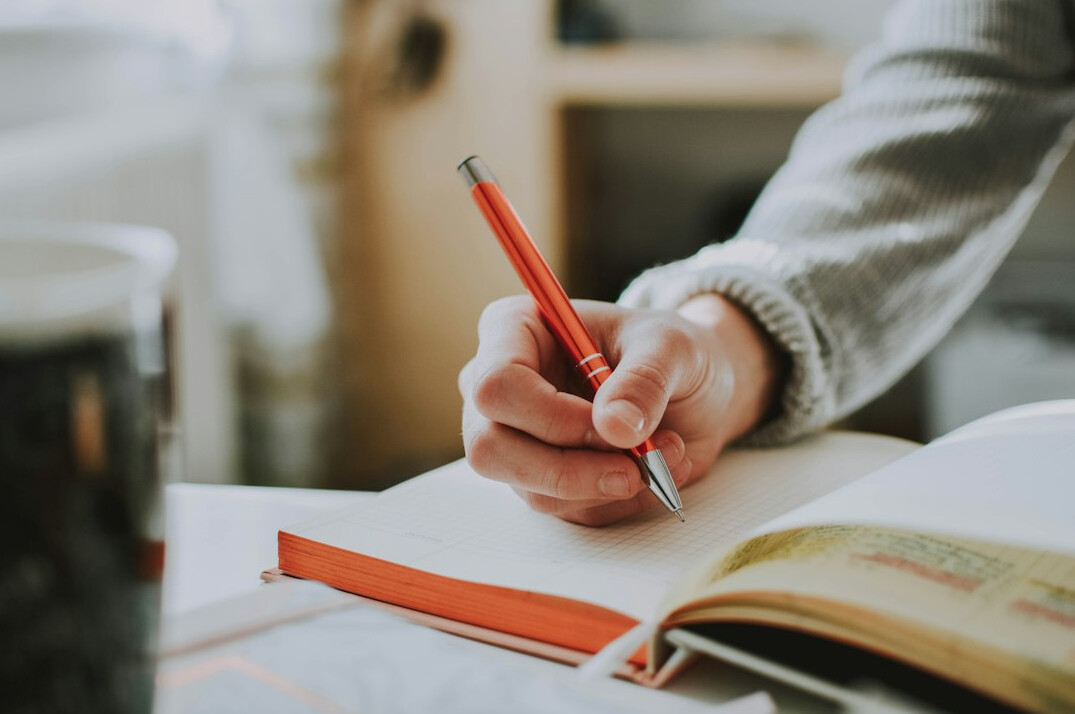 journalist writing notes